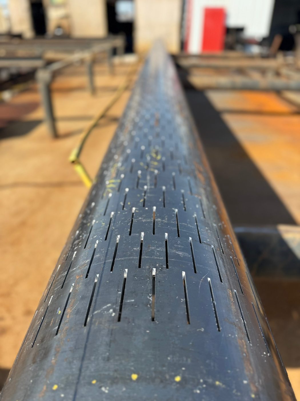 Slotted casing machined at B&B Pipe in Bakersfield, California